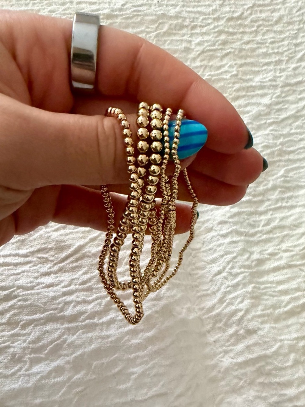 e newton look alike bracelet stack